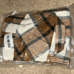 Size Small thick oversized flannel. Brand new! Never opened.